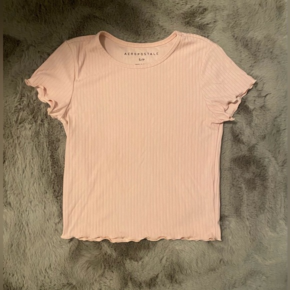 Arie pink shirt with ruffled endings on both arms and bottom. Good quality. - Picture 2 of 5